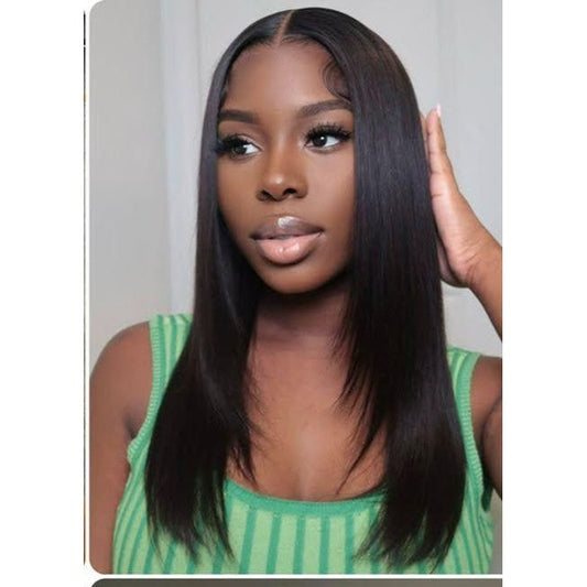 Layered lace closure wig with pre-bleached knots and glueless design, ready to wear and slay.